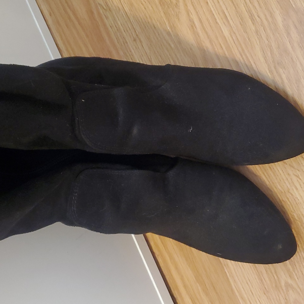 Knee length suede boots
